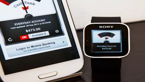 Cash tank watch and app closeup