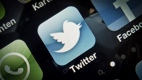 Twitter report abuse button