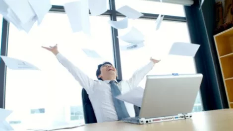 Businessman paper laptop