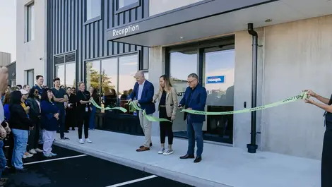 Enatel ribbon cutting