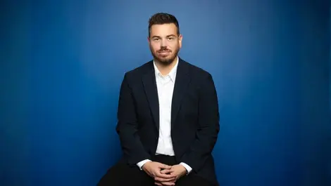 Headshot josh gammer gm hat disti